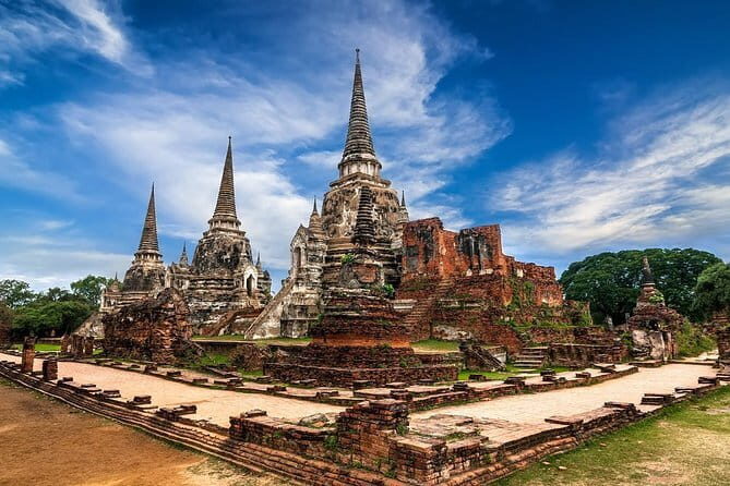 Ayutthaya Elephant Village ATV and Floating Market by Tuk Tuk - Temple time in Ayutthaya: Wat Mahathat, Wat Yai Chai Mongkhon, and Wat Chaiwatthanaram